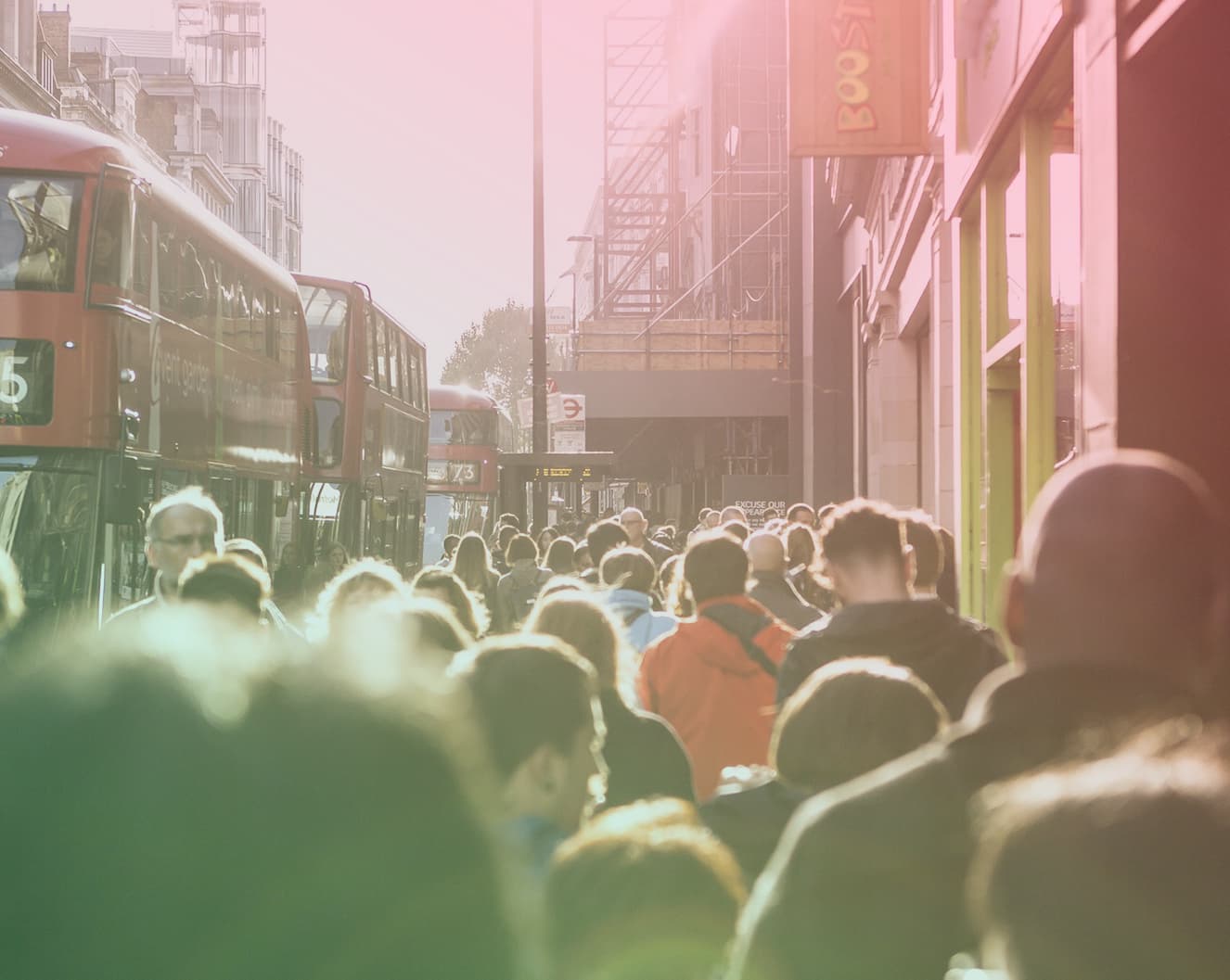 people walking down a busy London street
