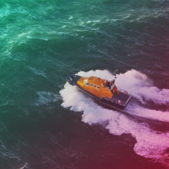An aerial photo of an RNLI lifeboat at sea